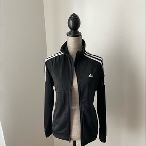 Adidas women’s track suit.